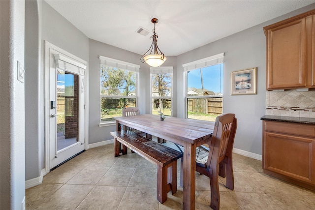 dining room with light tile patterned floors