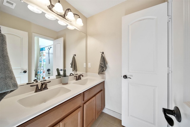 bathroom featuring tile patterned flooring, vanity, an inviting chandelier, and walk in shower