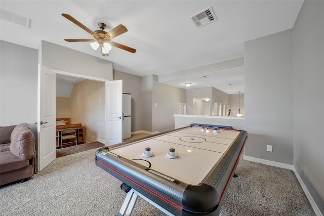 game room with ceiling fan and carpet flooring