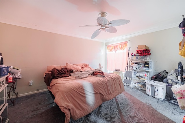 bedroom with crown molding, ceiling fan, and dark carpet