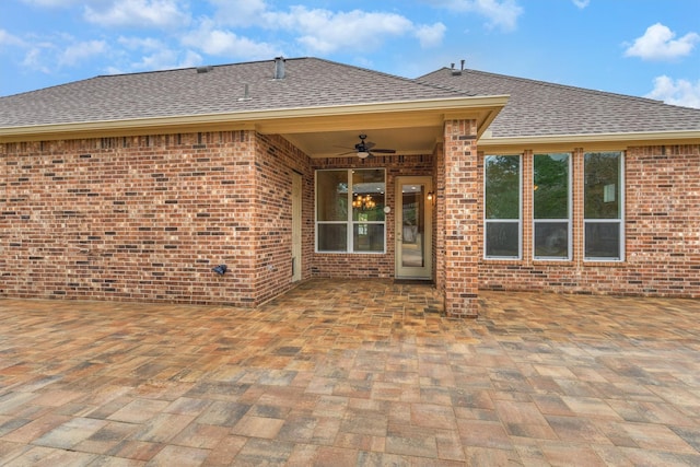 rear view of house featuring a patio area and ceiling fan