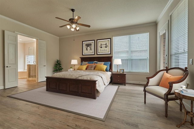 bedroom with ceiling fan, ornamental molding, and light hardwood / wood-style flooring