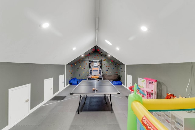 game room featuring vaulted ceiling