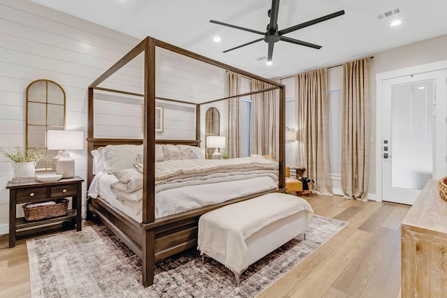 bedroom featuring ceiling fan and light hardwood / wood-style floors