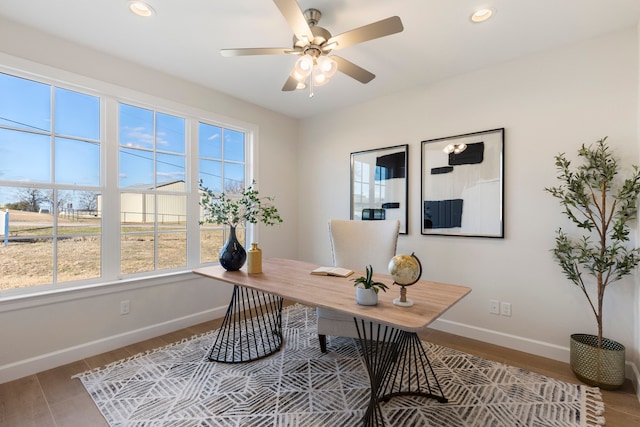 office space with ceiling fan