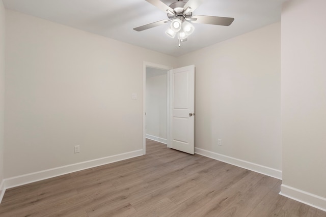 unfurnished room featuring ceiling fan and light hardwood / wood-style floors