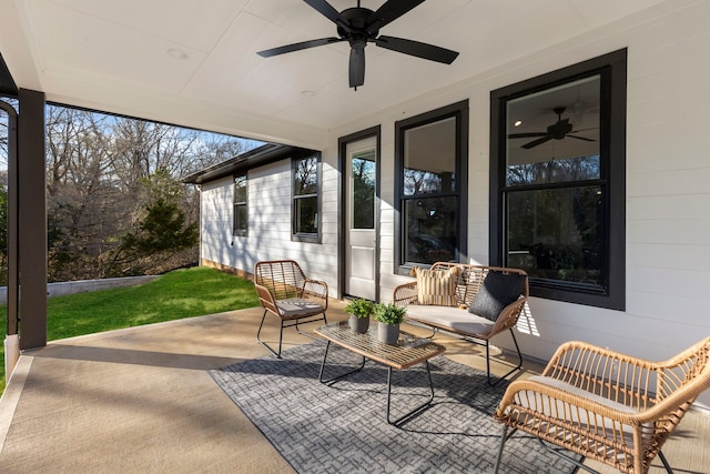 exterior space featuring ceiling fan