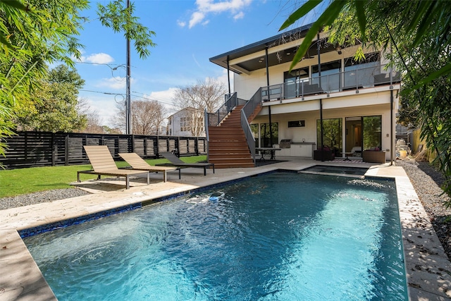 view of swimming pool featuring a patio area