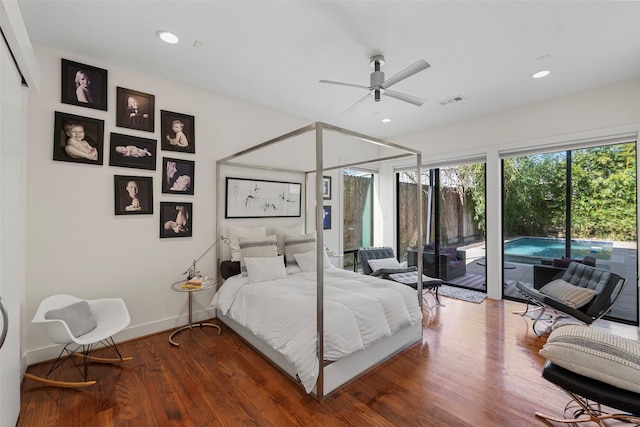 bedroom featuring ceiling fan, wood-type flooring, and access to exterior