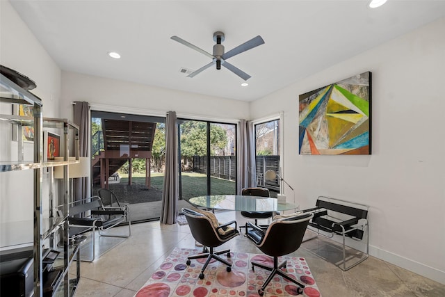 dining room featuring ceiling fan