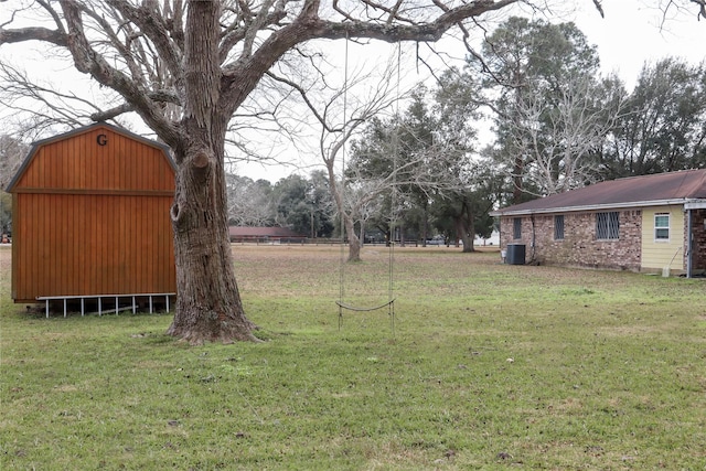 view of yard featuring central AC