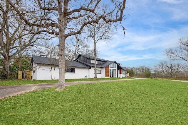 view of property exterior featuring a yard