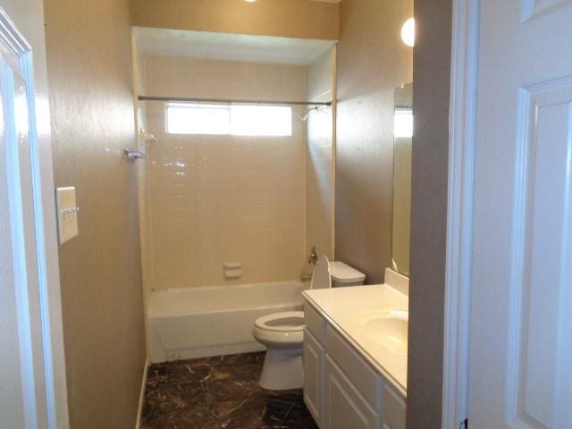 full bathroom with toilet, vanity, and  shower combination