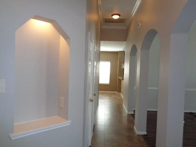 hallway with crown molding