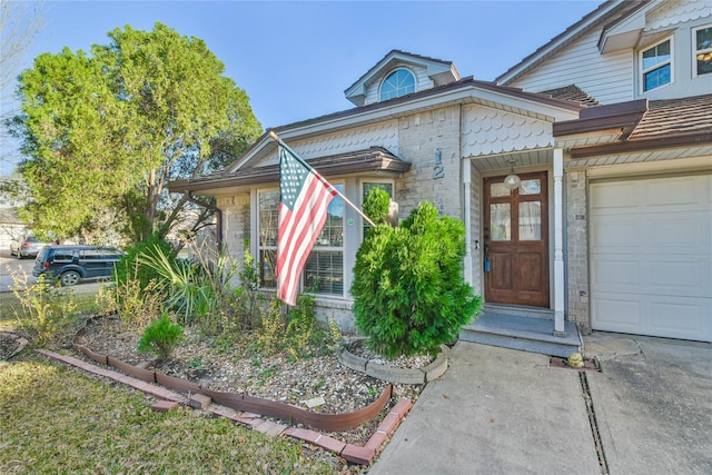 doorway to property featuring a garage