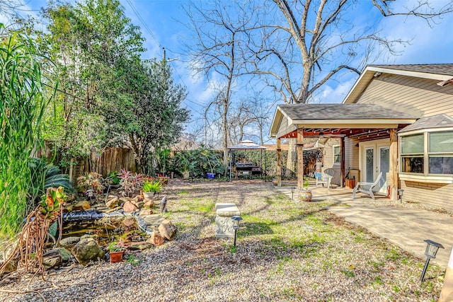 view of yard featuring a gazebo and a patio