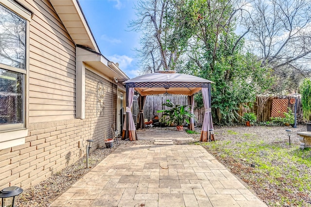 view of patio featuring a gazebo