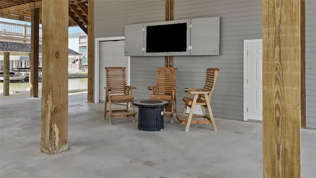 view of patio featuring an outdoor fire pit