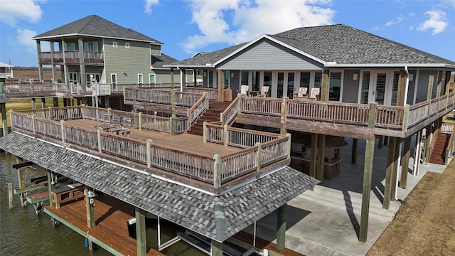 rear view of house with a water view