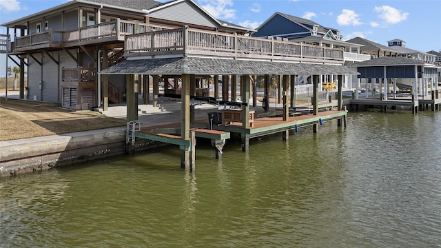 view of dock with a water view