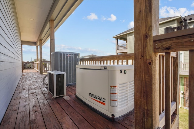 wooden deck with central air condition unit