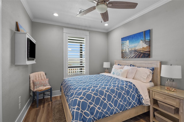 bedroom with dark wood-type flooring, ornamental molding, and ceiling fan