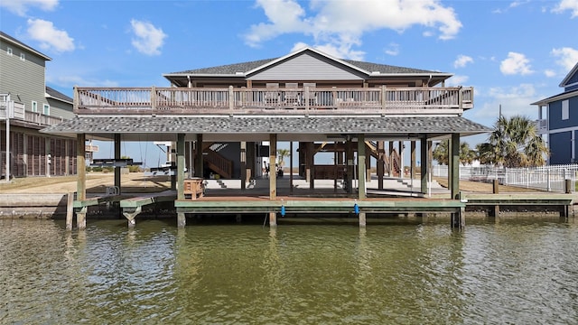 view of dock featuring a deck with water view