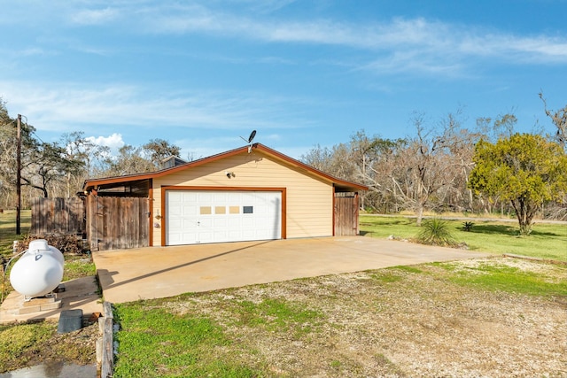 garage with a lawn