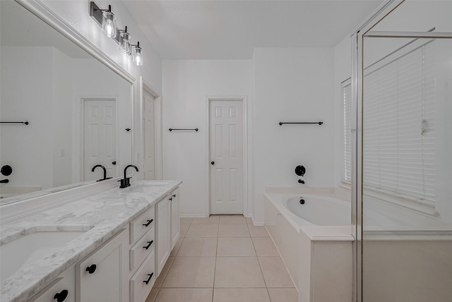 bathroom with vanity, tile patterned floors, and separate shower and tub