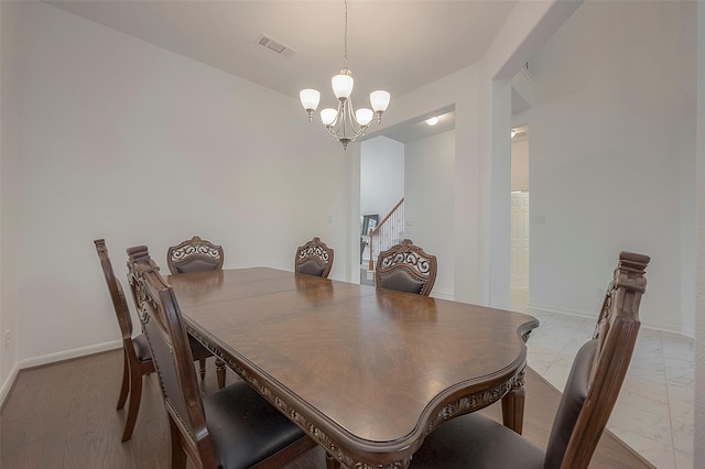 dining area with a chandelier