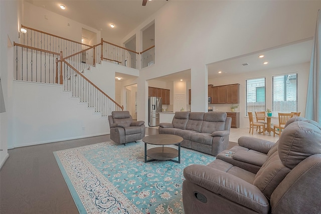 living room with a high ceiling