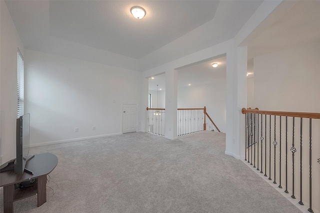 empty room with light colored carpet