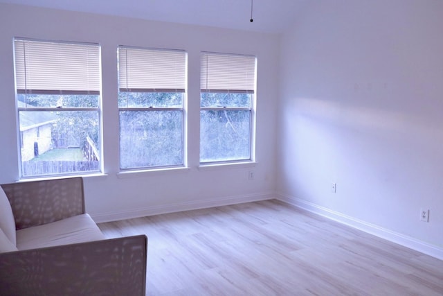 unfurnished room featuring light hardwood / wood-style floors