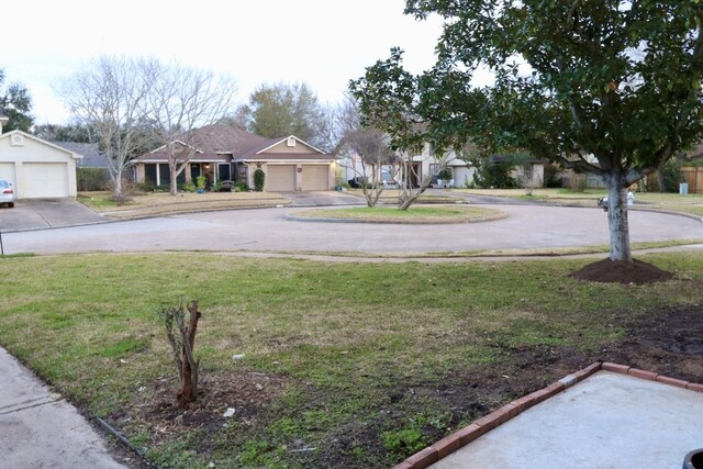 view of yard with a garage