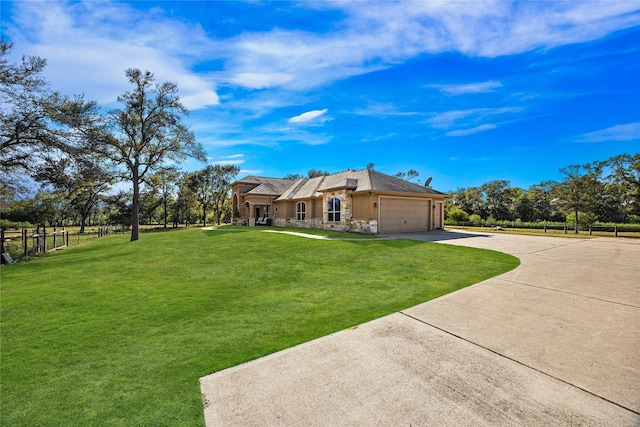 exterior space with a garage and a front yard