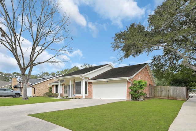 single story home with a garage and a front lawn