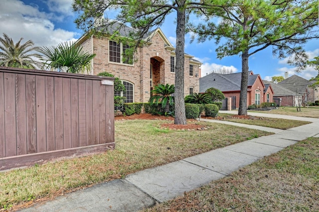 view of front of house with a front lawn