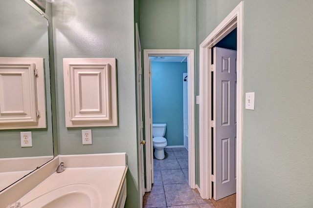 12726 Silverglen Estates Dr, Houston, TX 77014 - bathroom with toilet, tile patterned flooring, and vanity