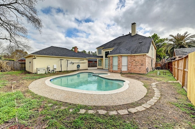12726 Silverglen Estates Dr, Houston, TX 77014 - view of swimming pool featuring a fenced backyard, a fenced in pool, and a patio