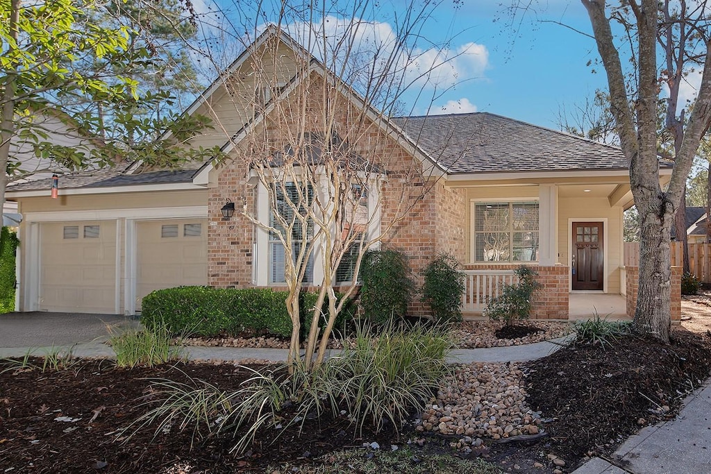 view of front of home featuring a garage and covered porch