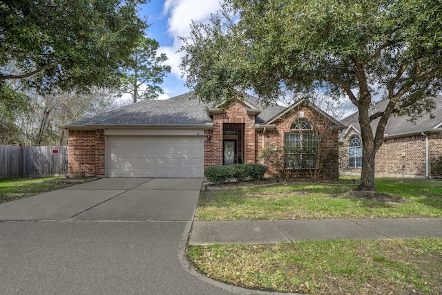 ranch-style house with a garage and a front lawn