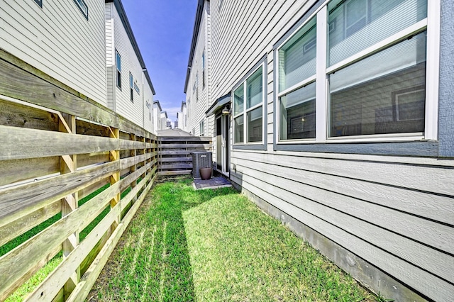 view of yard featuring central AC unit