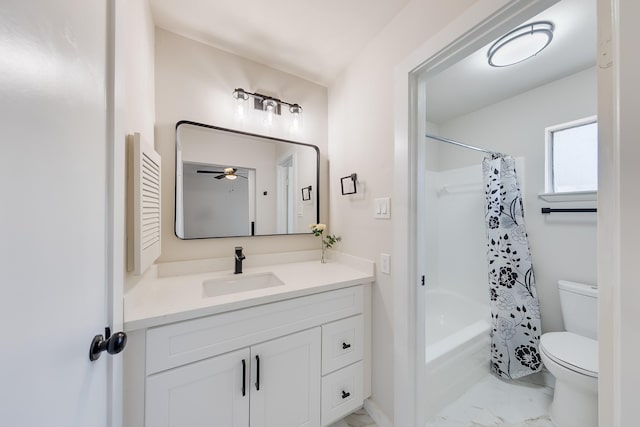 full bathroom with shower / tub combo with curtain, vanity, and toilet