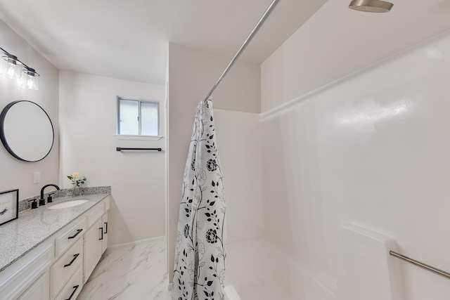 bathroom featuring a shower with curtain and vanity