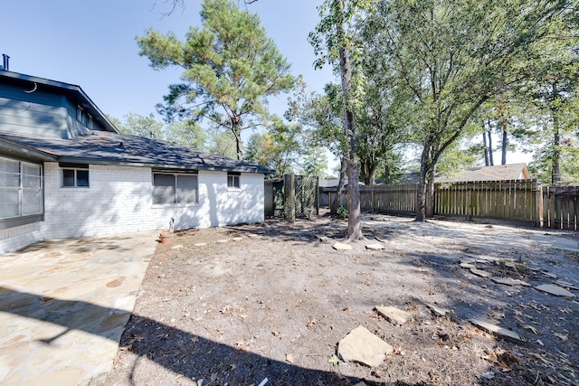 view of yard featuring a patio area