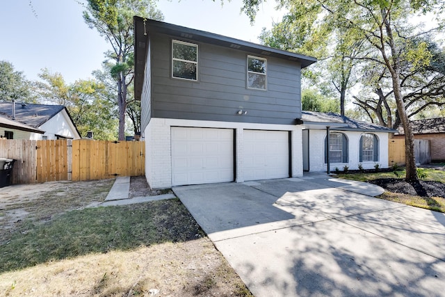 view of property featuring a garage