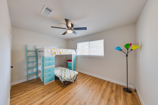 bedroom featuring wood-type flooring and ceiling fan