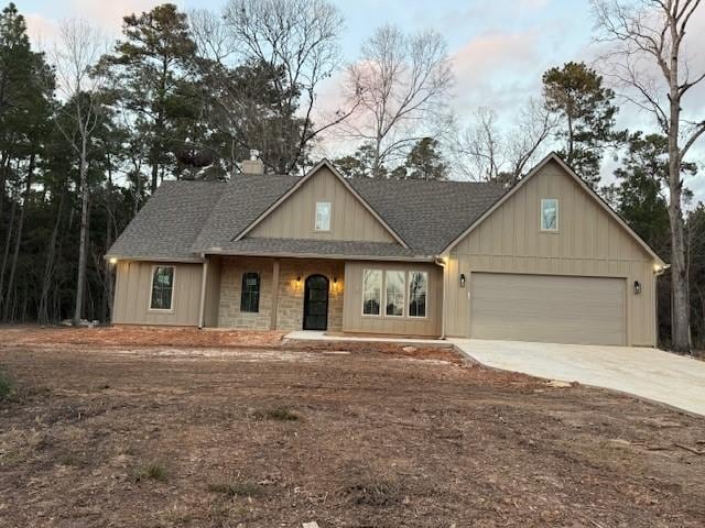 view of front of property with a garage