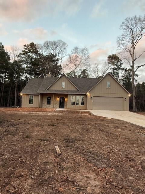 ranch-style house featuring a garage