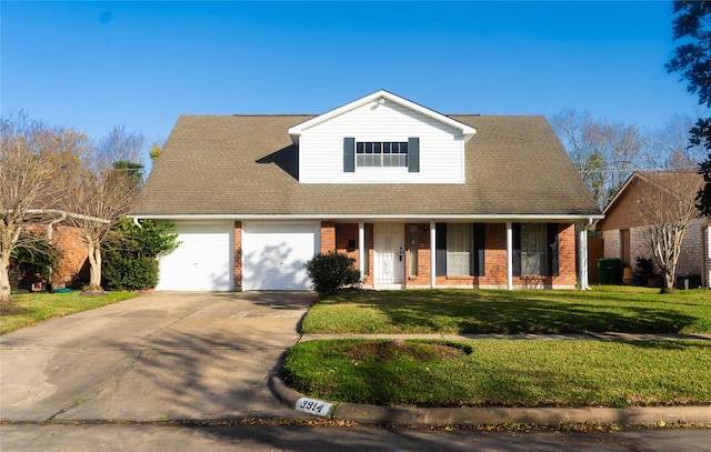 view of front of property featuring a porch, a garage, and a front lawn